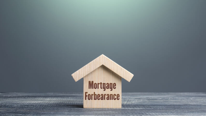 Mortgage Forbearance small wooden house concept