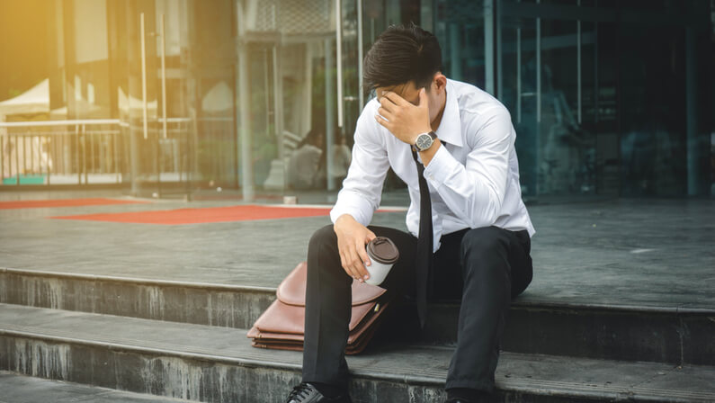 unemployed man sitting